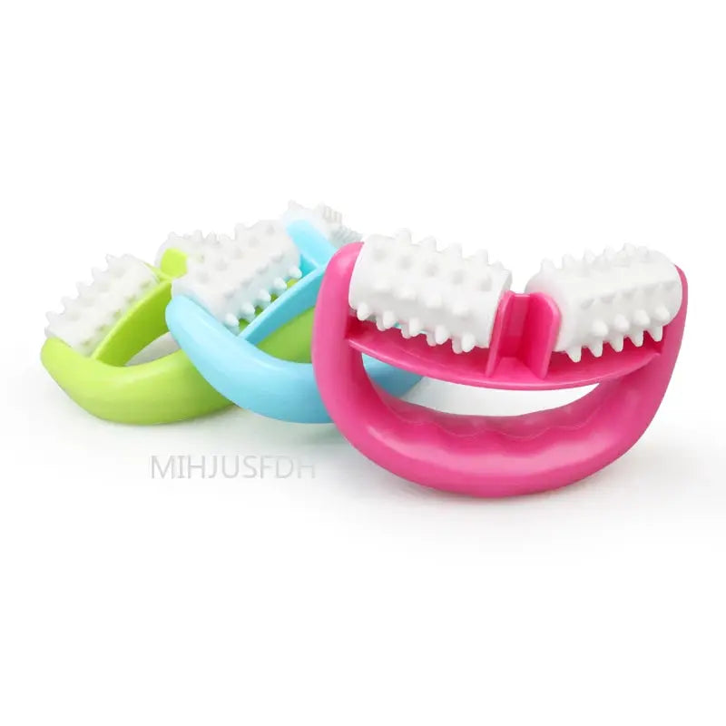 Simples Market anti-cellulite handheld roller massager; three-color pink/blue/green set with textured rolling heads.