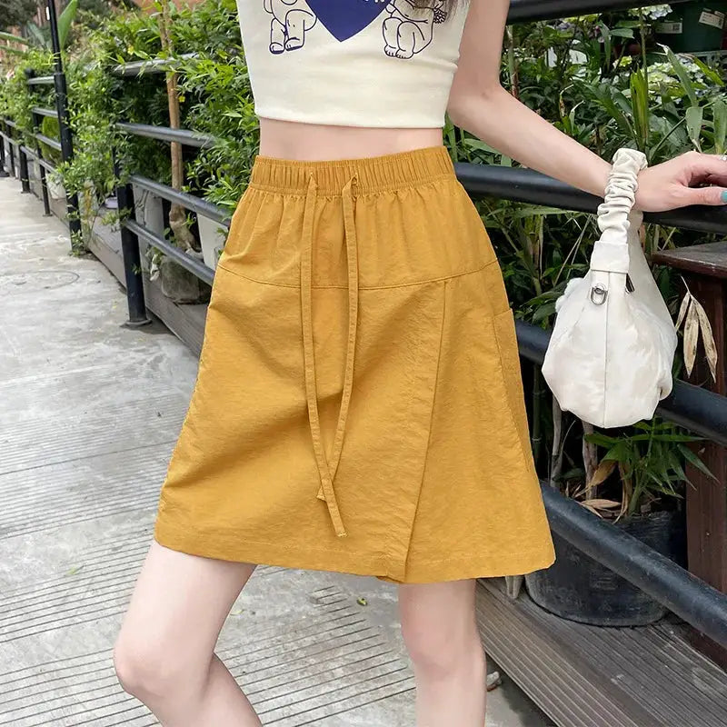 Women's mustard-yellow high-waisted A-line shorts with drawstring, lightweight summer bottoms