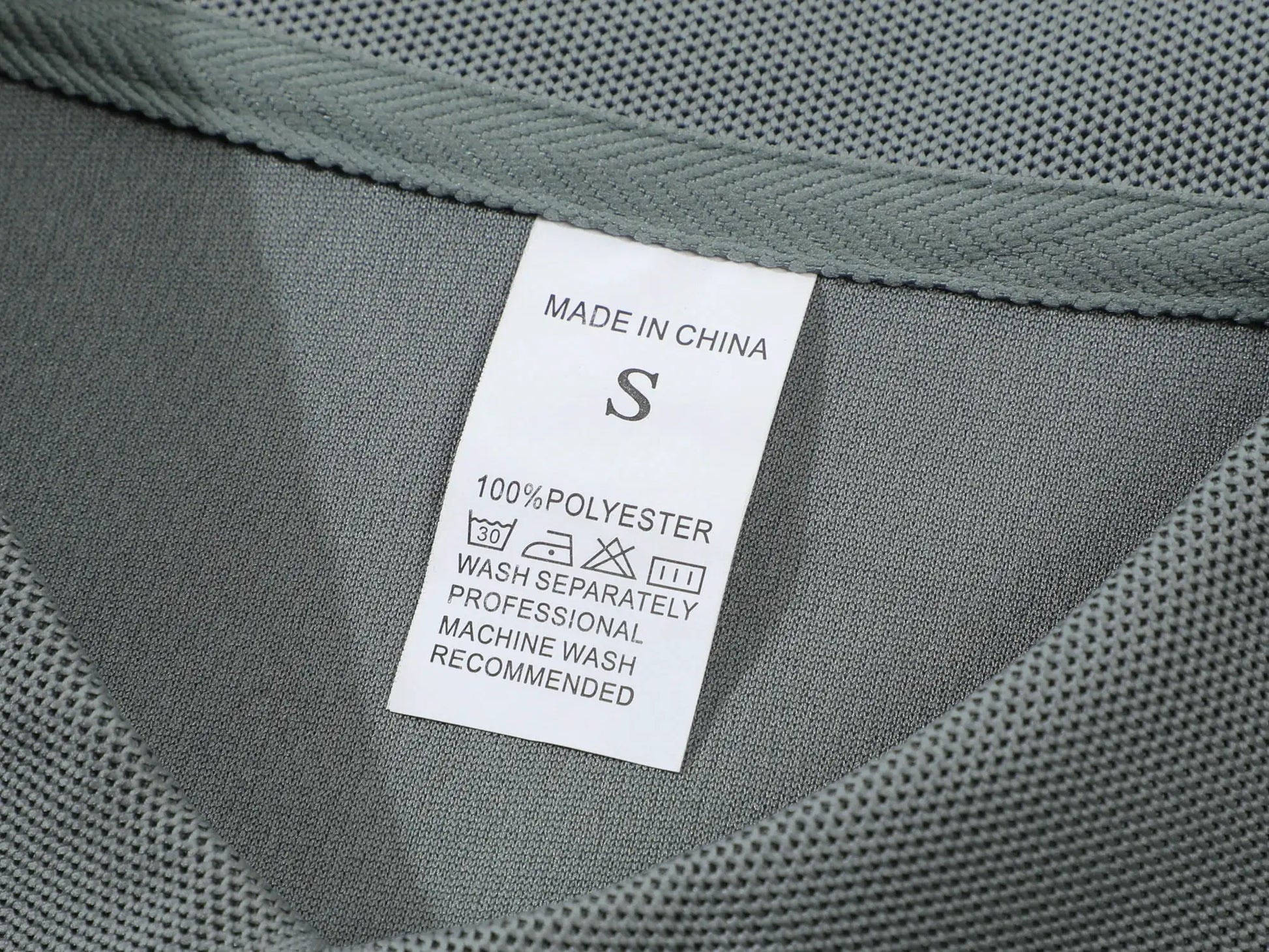 Men's gray polo shirt, 100% polyester, size S; tag reads Made in China.