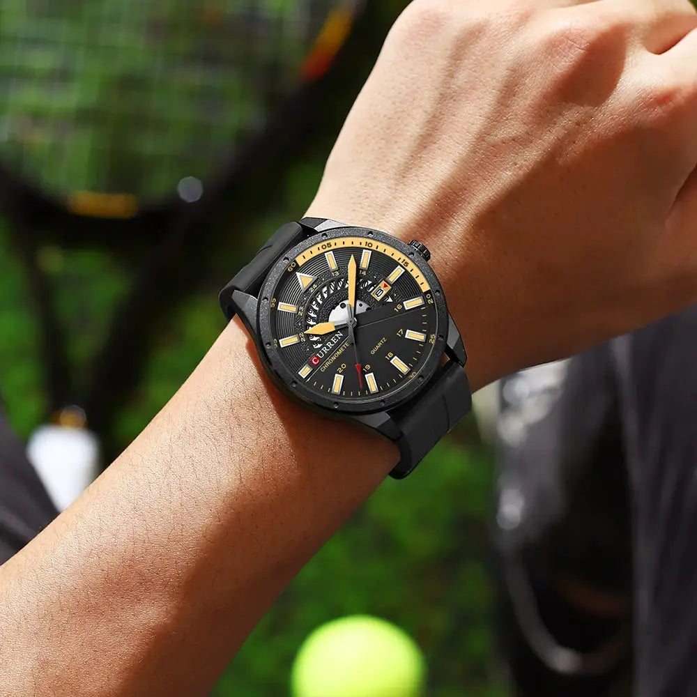 CURREN men's silicone sport wristwatch with black dial, yellow markers, and date display.