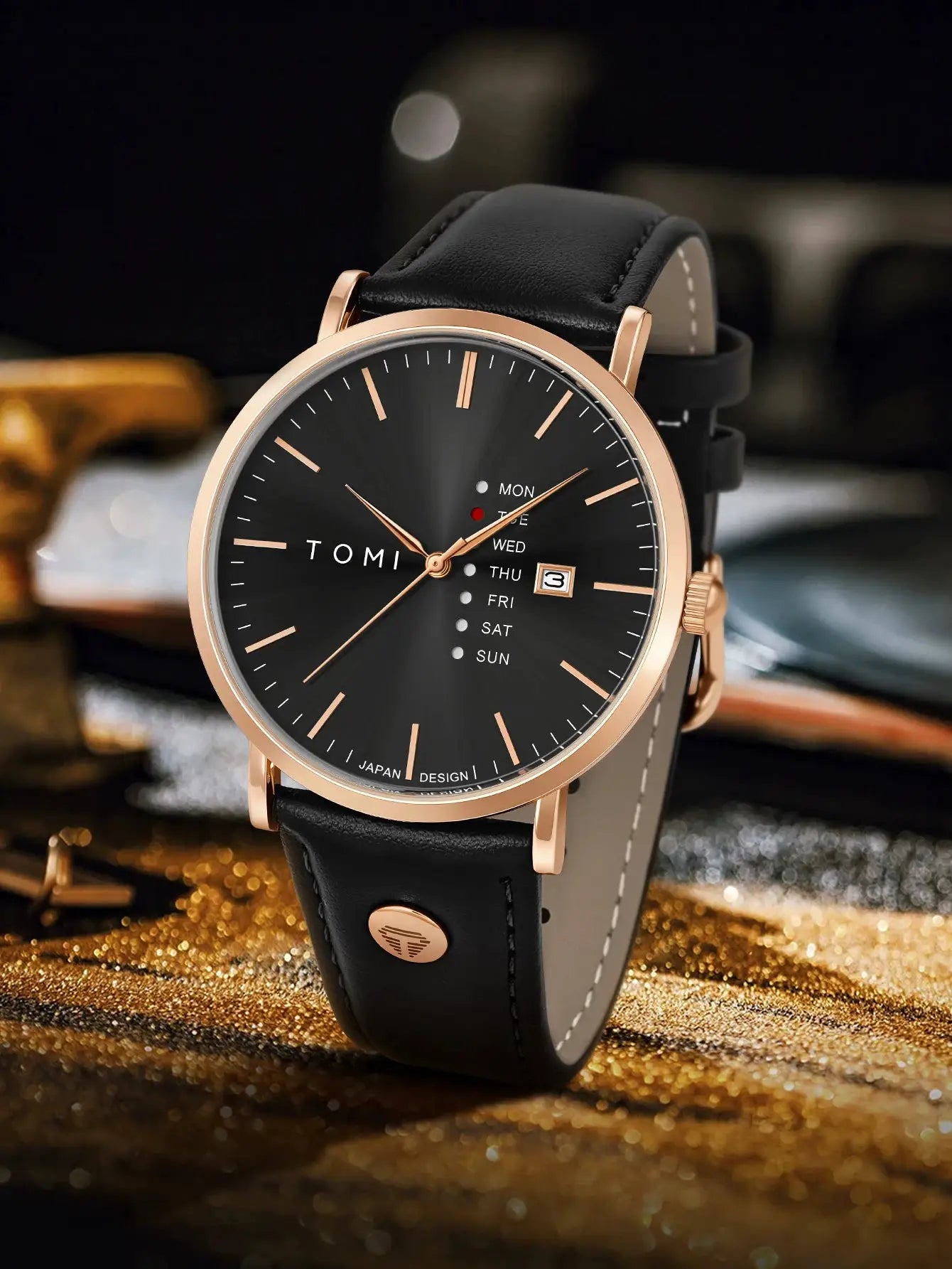 TOMI men's wristwatch with black dial, rose-gold case, and leather strap featuring weekday calendar
