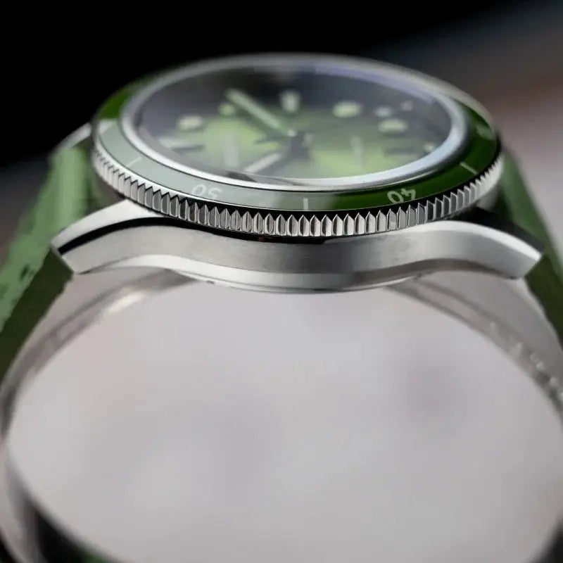 Proxima 39mm dive watch with green bezel and dial, green strap, stainless steel case.