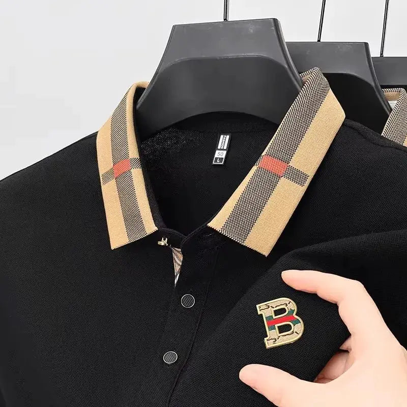 Men's black polo shirts with beige checked collars and B logo, two visible