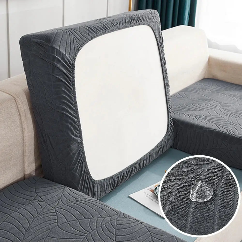 Waterproof stretch sofa cushion cover in dark gray jacquard fabric by Simples Market; removable protector.