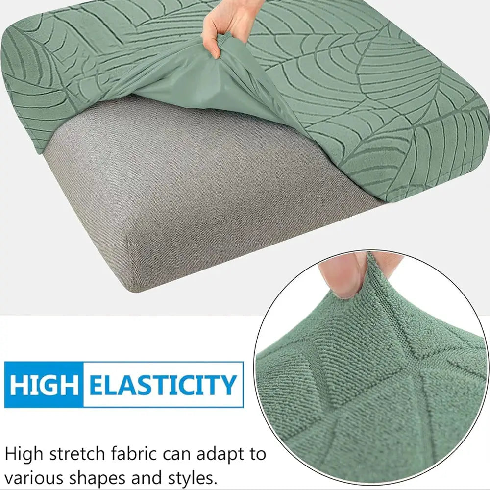 Waterproof stretch sofa cushion cover in green jacquard fabric; removable couch protector for chaise lounge.