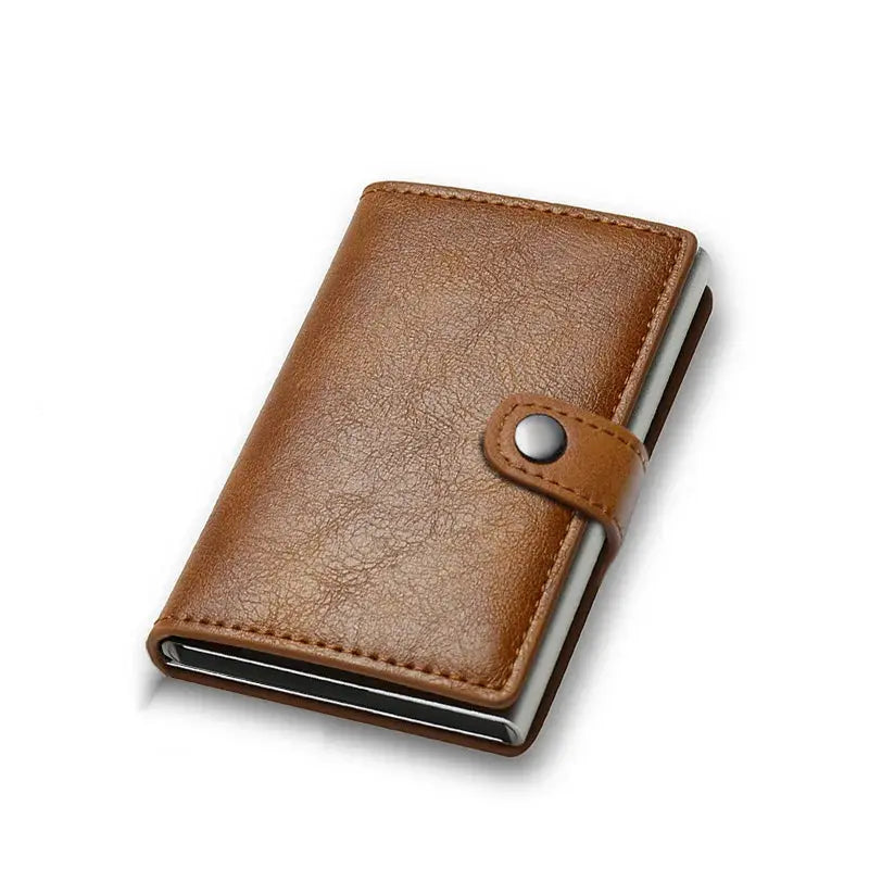Credit card holder in brown leather with snap strap