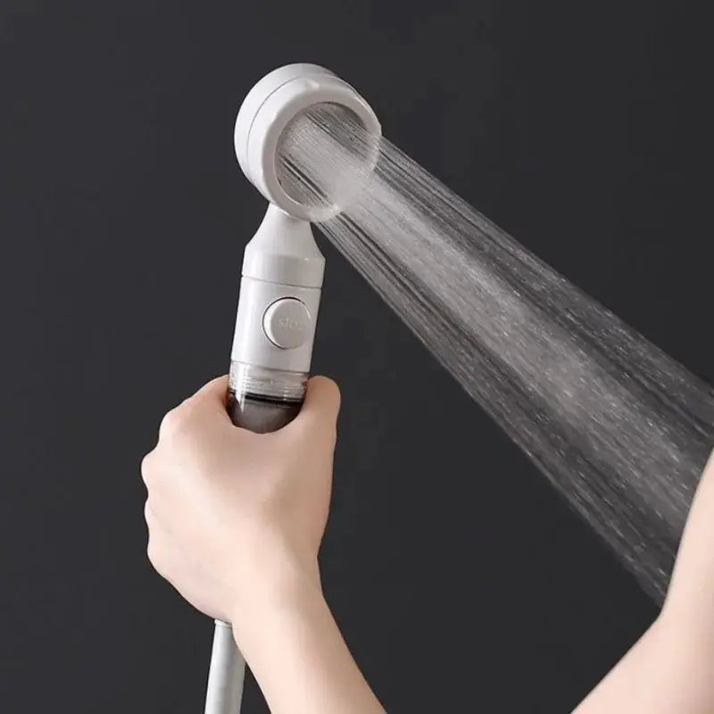 Simples Market travel portable pressurized shower head with water filter, white handheld nozzle.