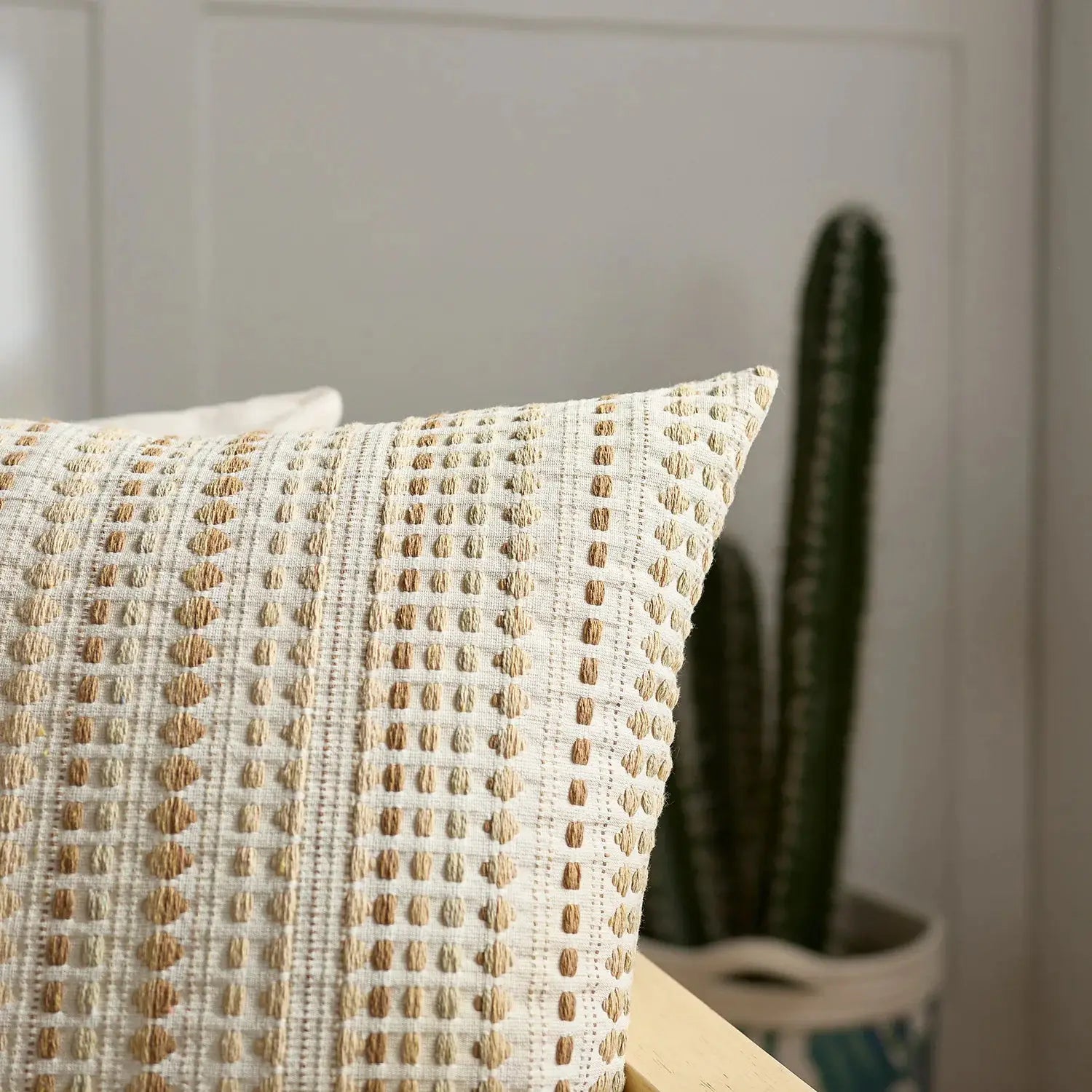 Boho dots jacquard cushion cover 45x45cm with zipper closure; beige fabric with tan embroidered dots.