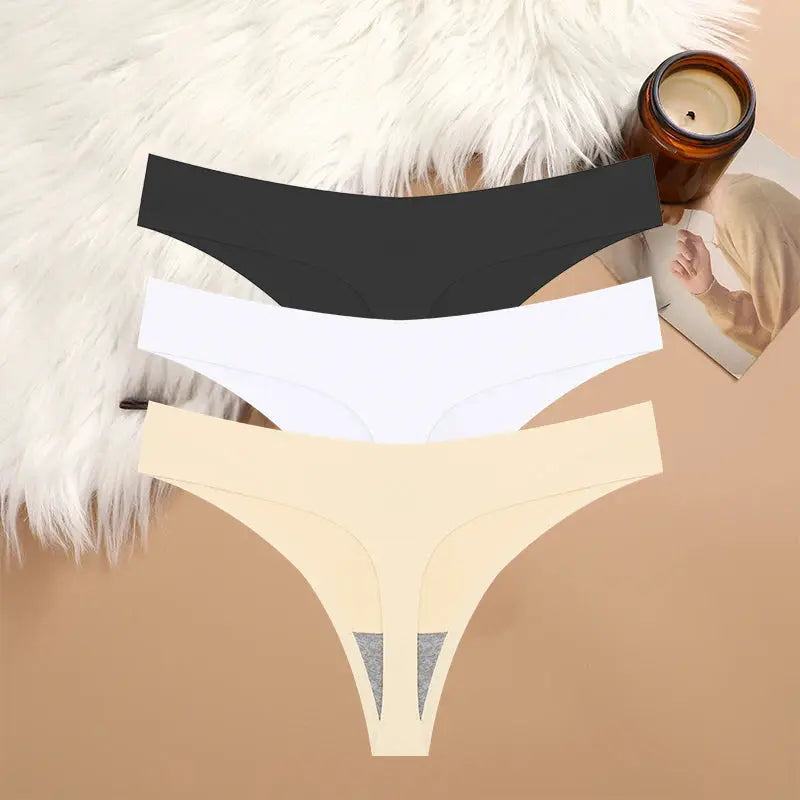 Three-piece breathable seamless low-waist G-string underwear set in black, white, and beige.