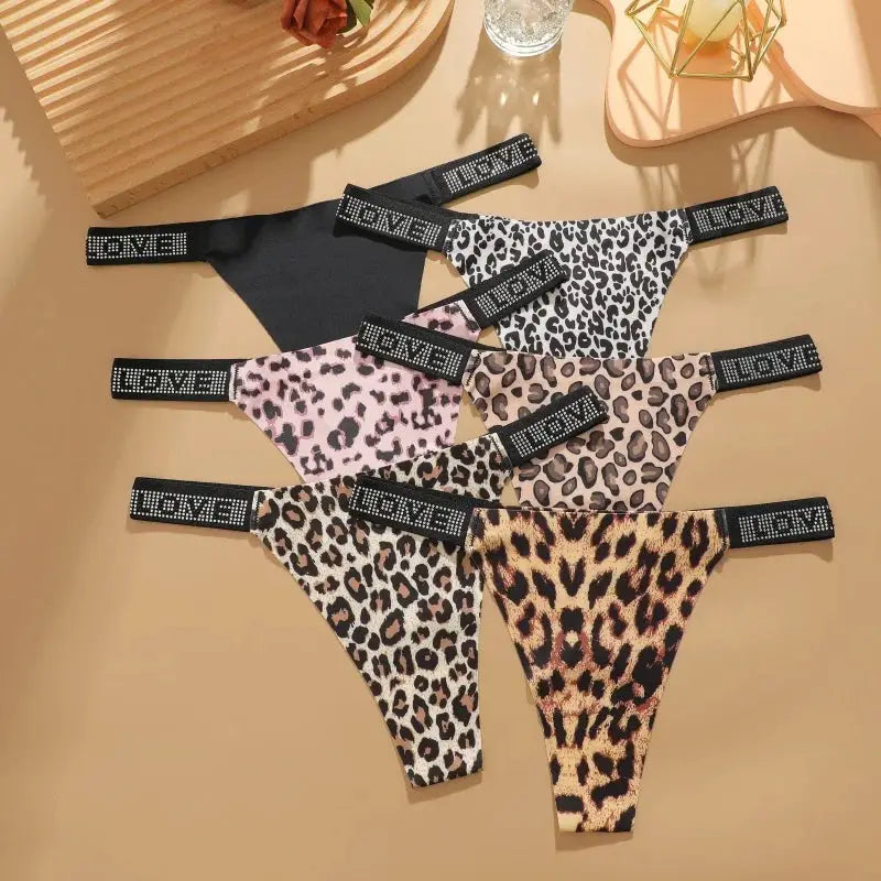 Low-rise thong panties set of 6 with leopard prints and black, rhinestone LOVE waistband