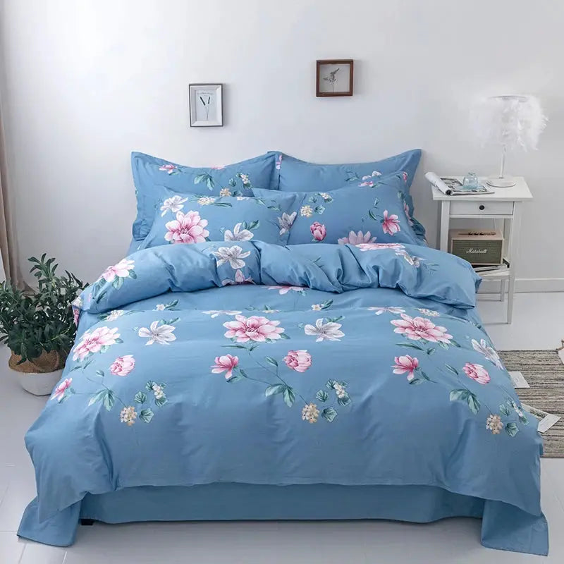 3-piece cotton duvet cover set in blue with pink floral print; includes 1 duvet cover and 2 pillowcases