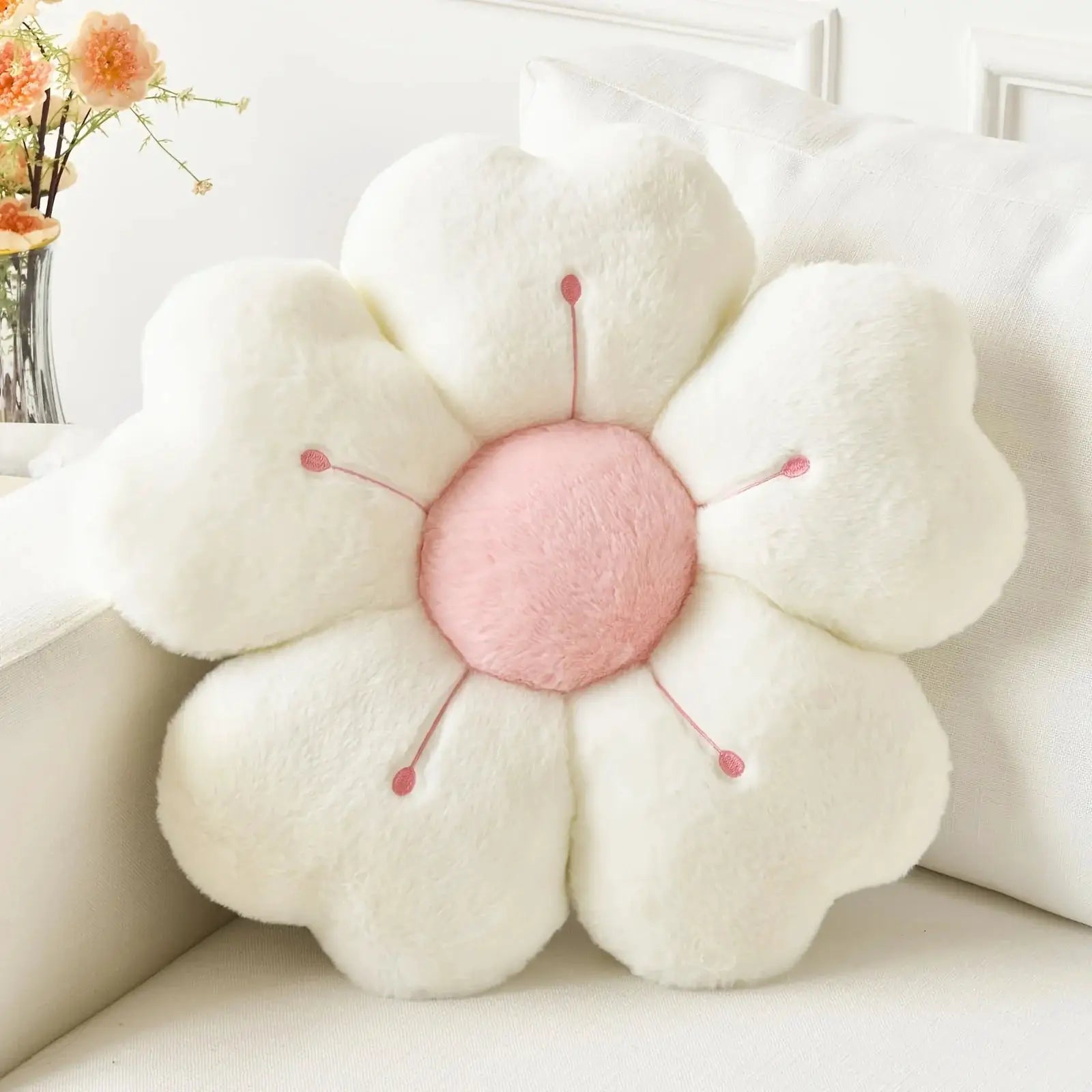 Flower-shaped plush throw pillow with white petals and pink center, soft sofa decor cushion