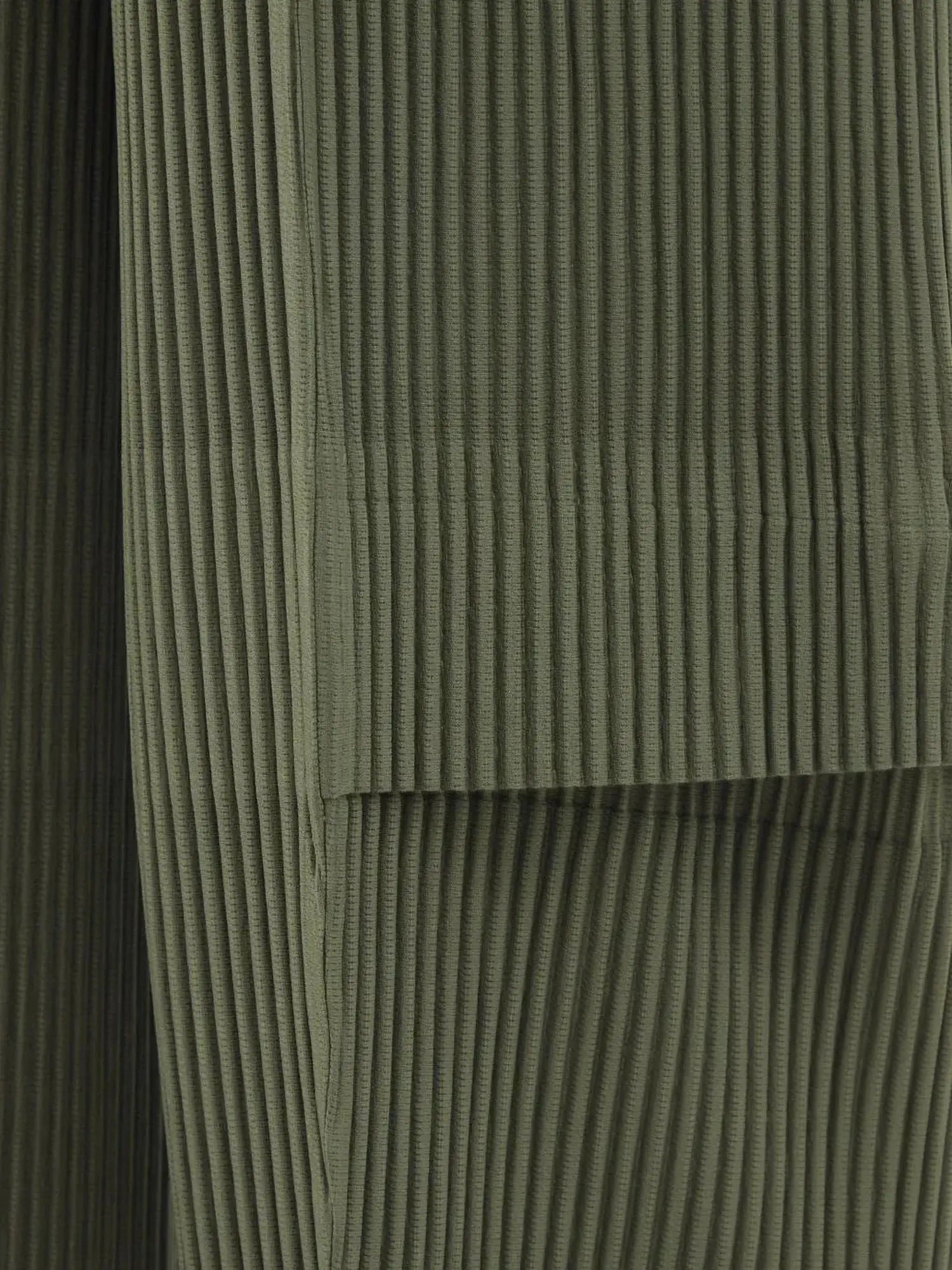 Miyake pleated men cargo pants fabric swatch in olive green corduroy with ribbed texture