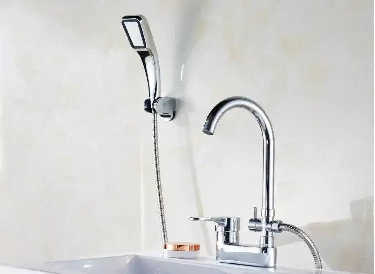 Chrome basin shower faucet mixer by Simples Market, deck-mounted with single-handle and handheld shower.