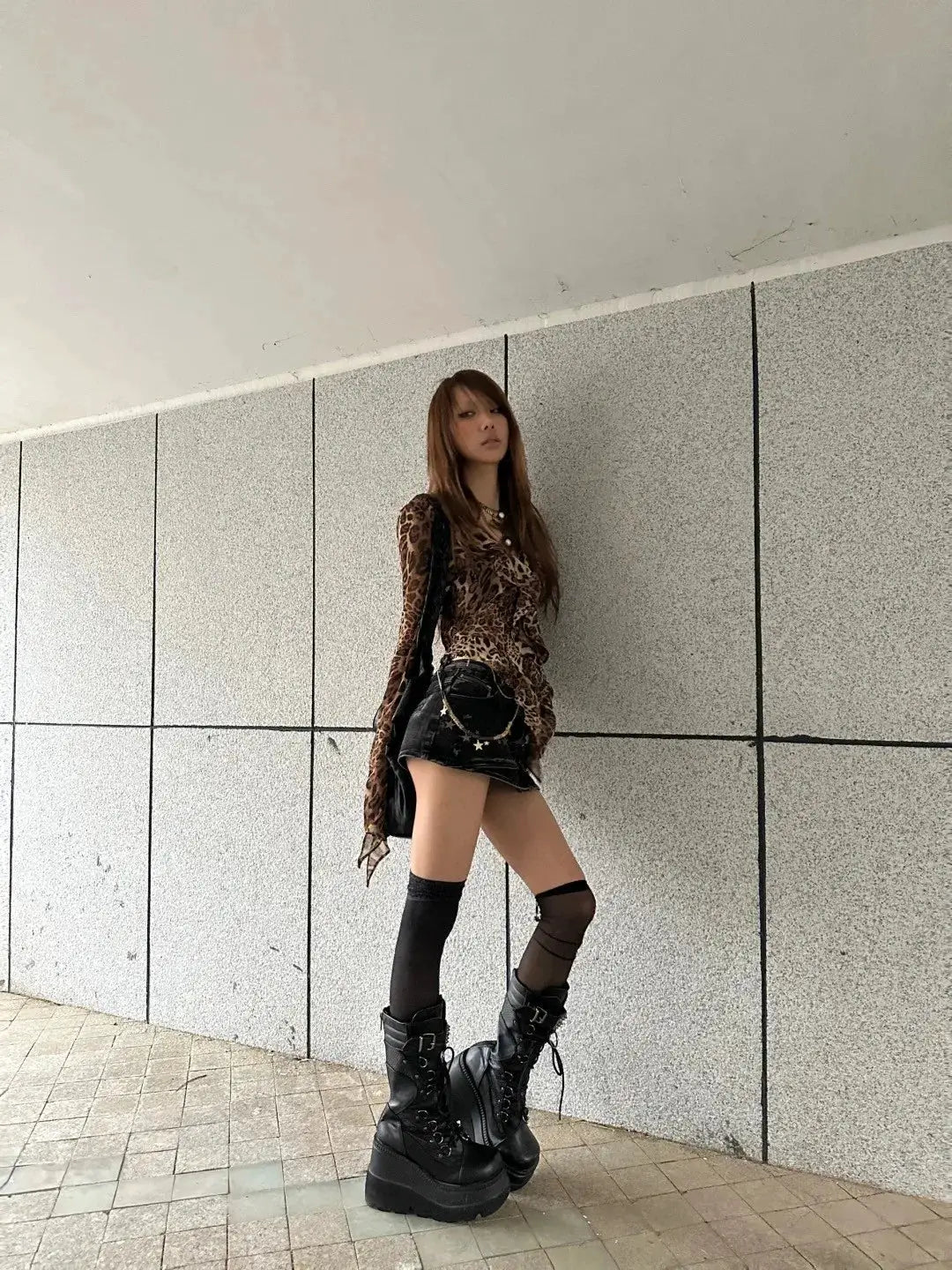 Simples Market karrram leopard print Y2K shirt with V-neck, paired with black mini skirt and chunky platform boots