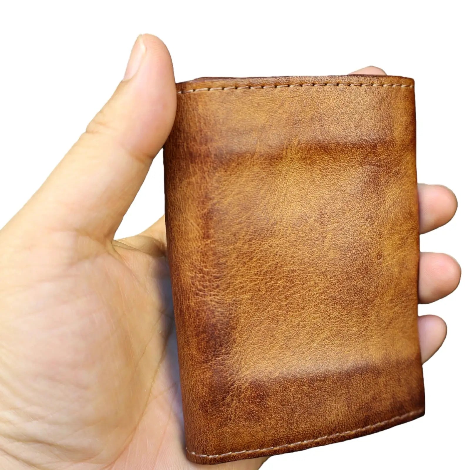 Genuine cowhide leather wallet in tan brown, compact card holder with visible stitching