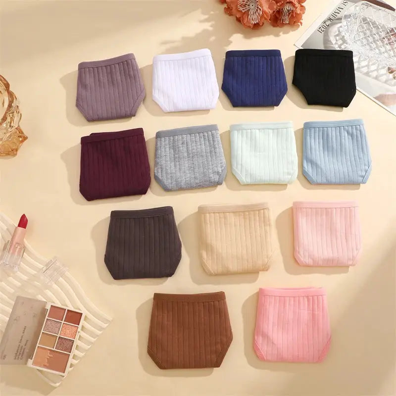 7-pack cotton striped thong underwear by Simples Market in assorted colors