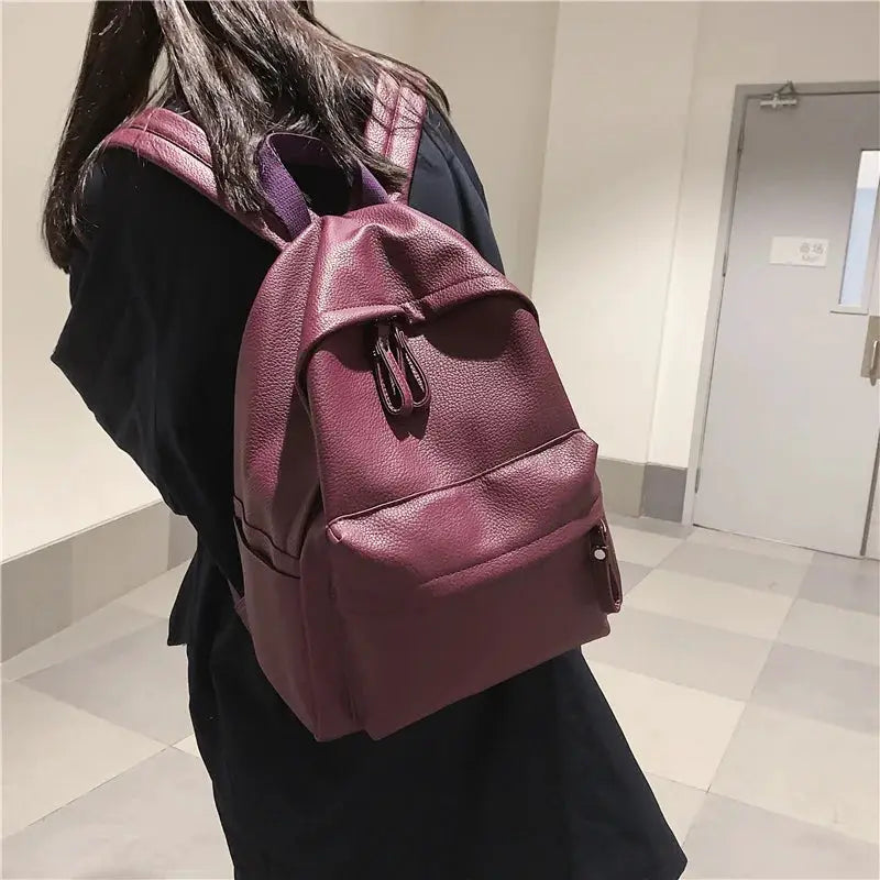HOCODO PU leather fashion backpack in burgundy with front zip pocket