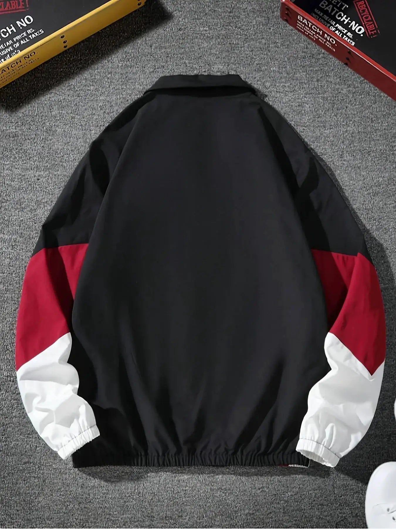 Men's color-blocked lightweight windbreaker jacket by Simples Market, black with red sleeve panels and white cuffs