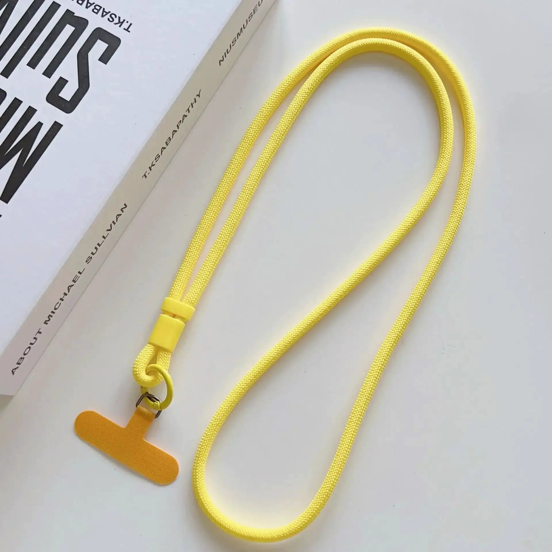 Phone lanyard in bright yellow nylon with diagonal crossbody rope and adjustable slider, Simples Market