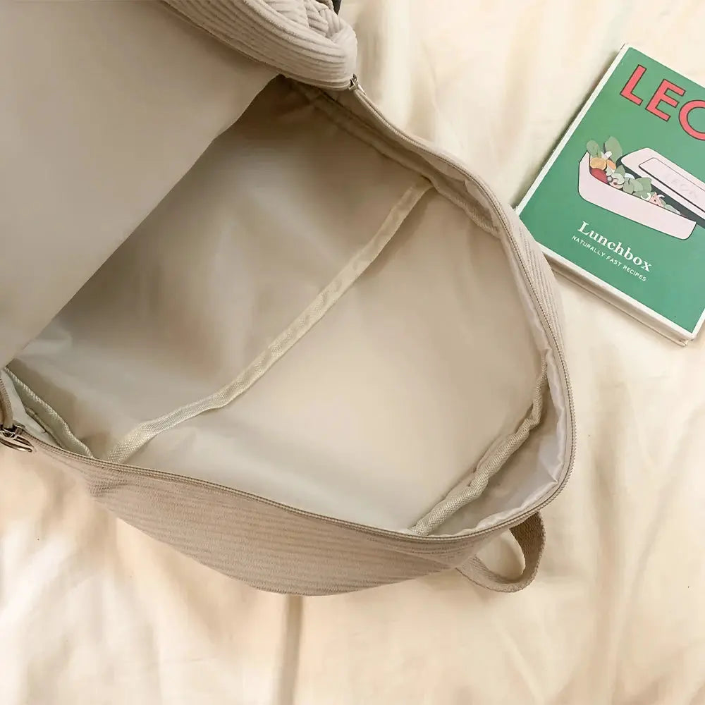 Backpack by Simples Market in beige, open main compartment with light lining