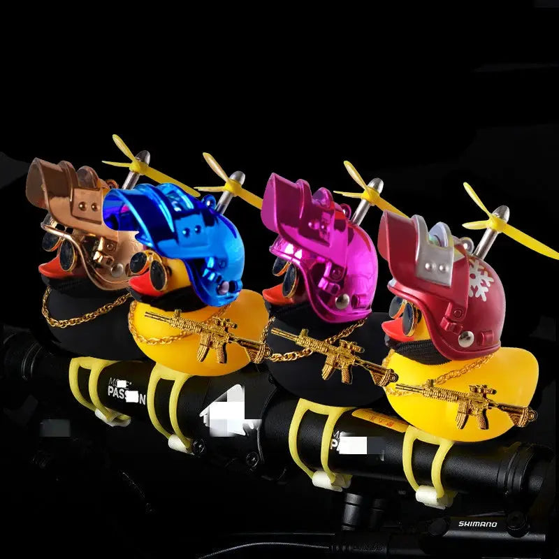 Four yellow rubber ducks with helmets for car interior decoration
