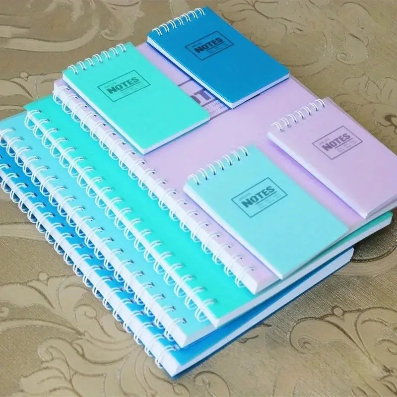 10pcs mixed-color pastel mini spiral-bound note pads; pocket memo pads in mint, teal, lavender