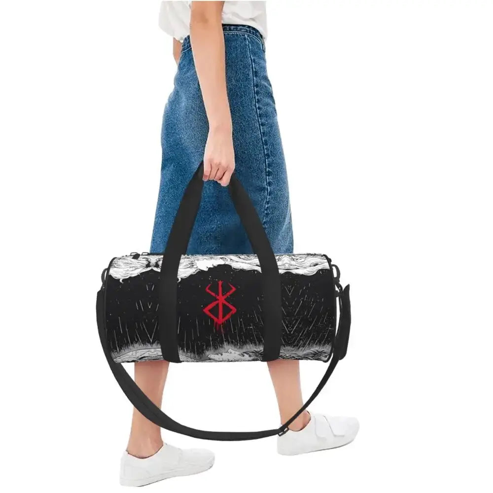 Berserk Japan anime gym bag, black cylindrical duffel with white pattern and red logo, with black handles