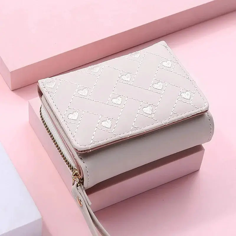 Women's PU leather tri-fold wallet with quilted love pattern in pastel pink, Simples Market