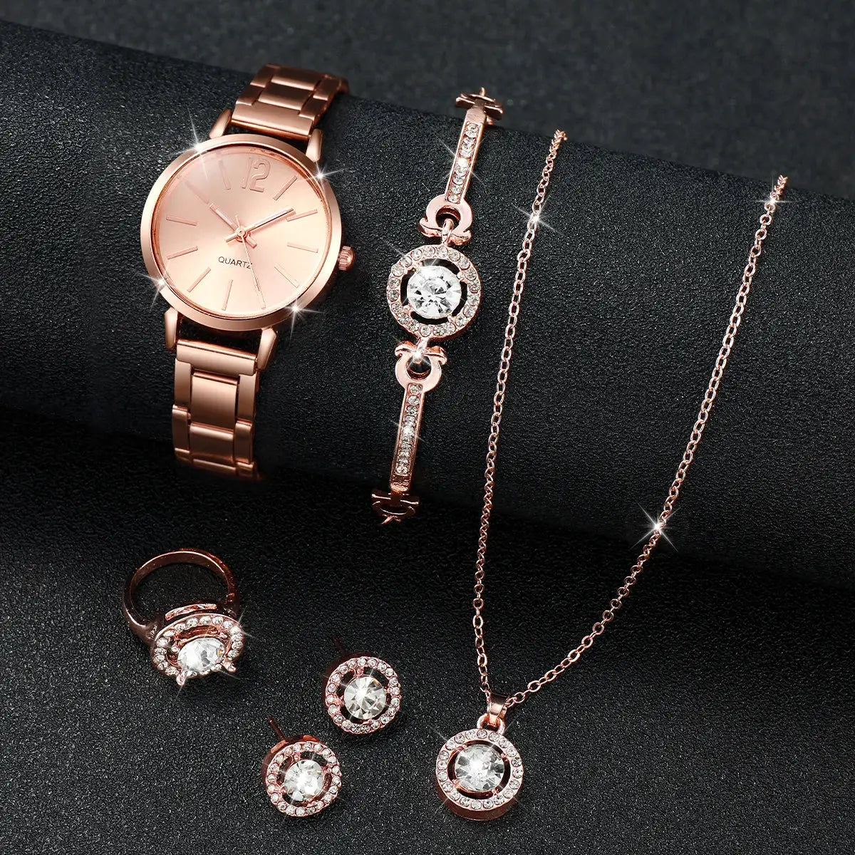 Rose gold 6-piece women's quartz watch and jewelry set with diamond accents and stainless steel band