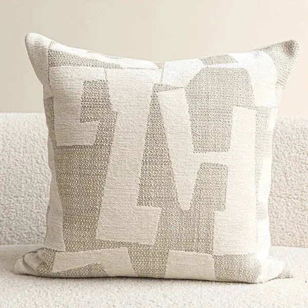 Cream ivory decorative pillow cover with a geometric pattern; textured fabric for sofa or chair.
