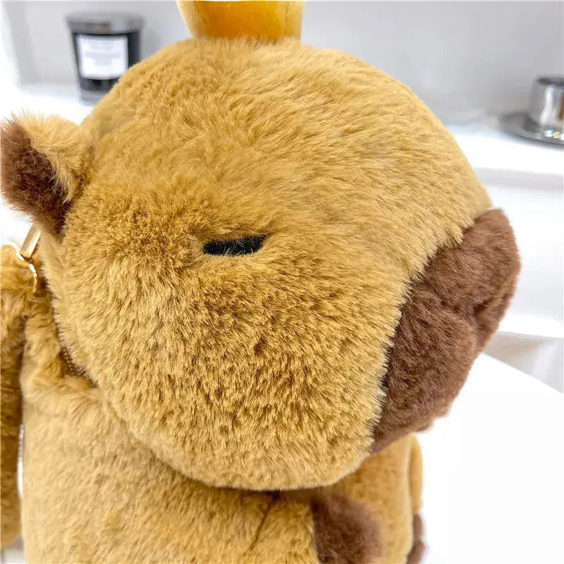 Capybara plush backpack by Simples Market; tan with brown ears, crossbody shoulder bag