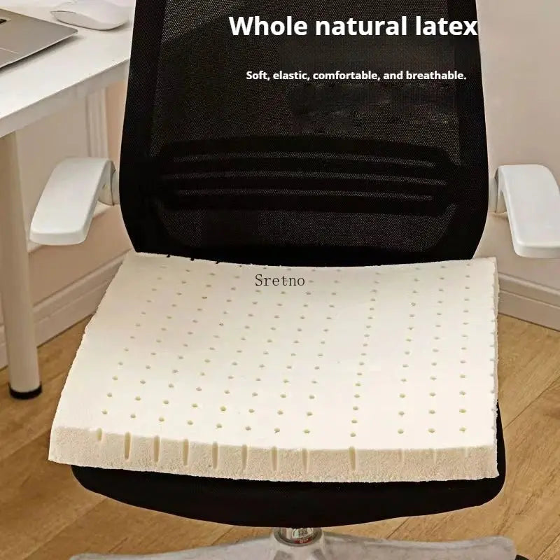 Sretno natural latex chair cushion, white perforated foam on a black office chair