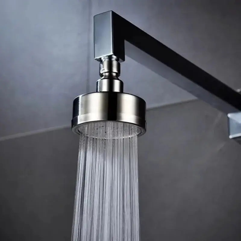 Shower head by Simples Market: 304 stainless steel brushed finish with circular spray face, wall-mounted
