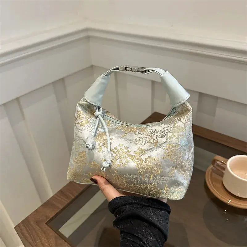 Simples Market Chinese-style embroidered handbag in pale blue satin with gold floral pattern, shoulder bag