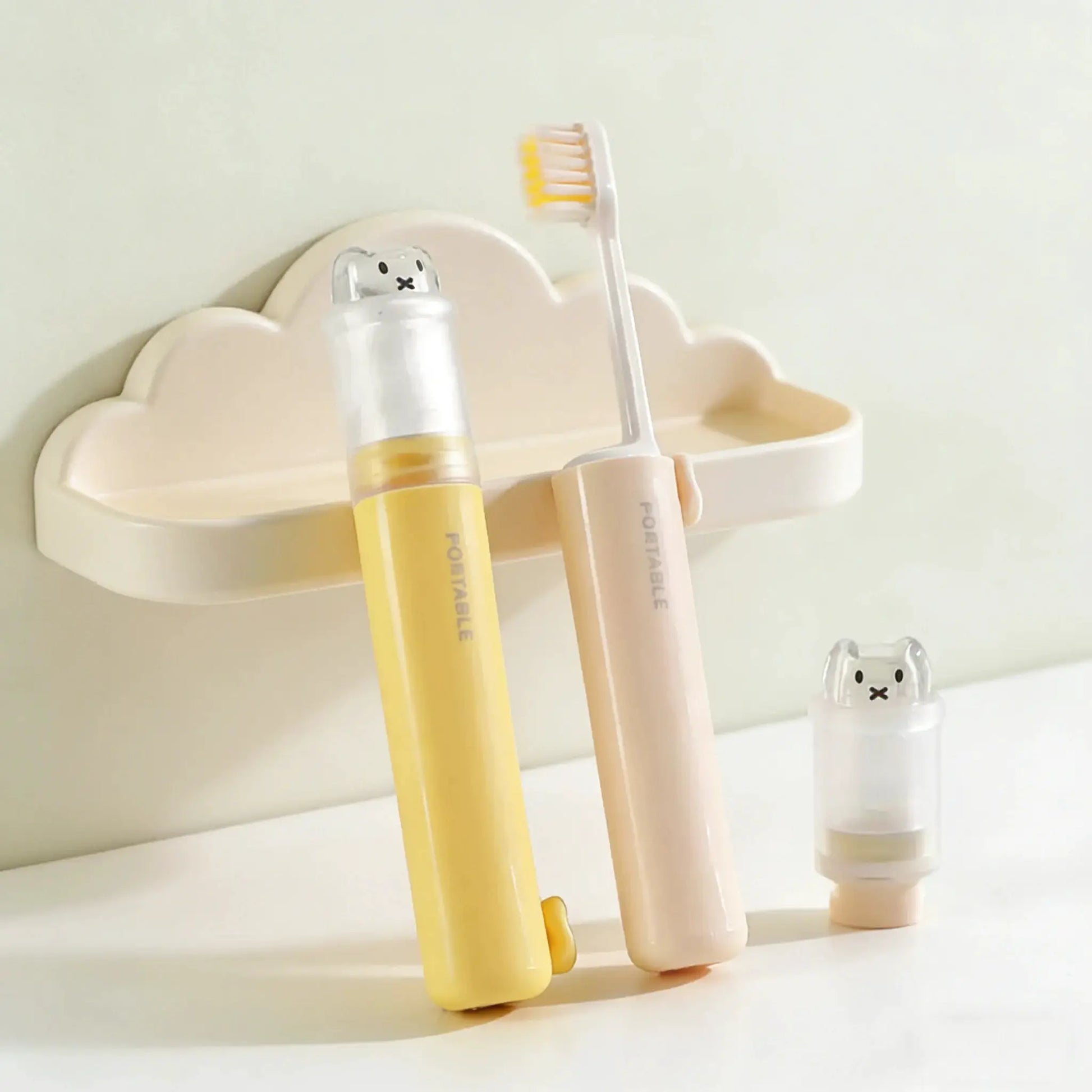 2-in-1 foldable travel toothbrush set in pastel macaron colors with bear dust caps, 3-piece