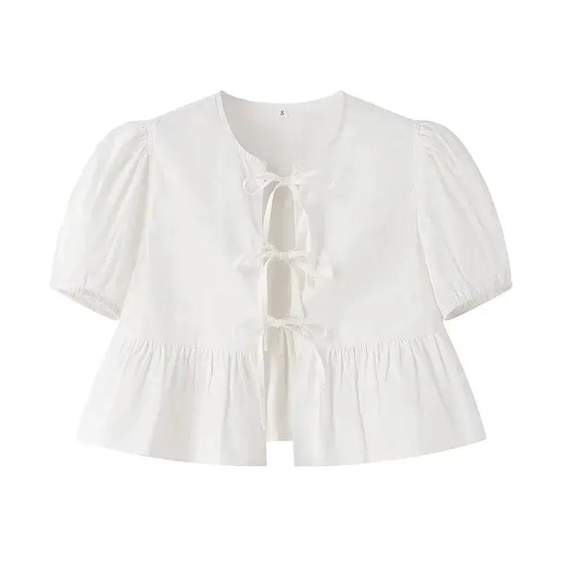 Simples Market white puff-sleeve peplum blouse with tie-front lace closures