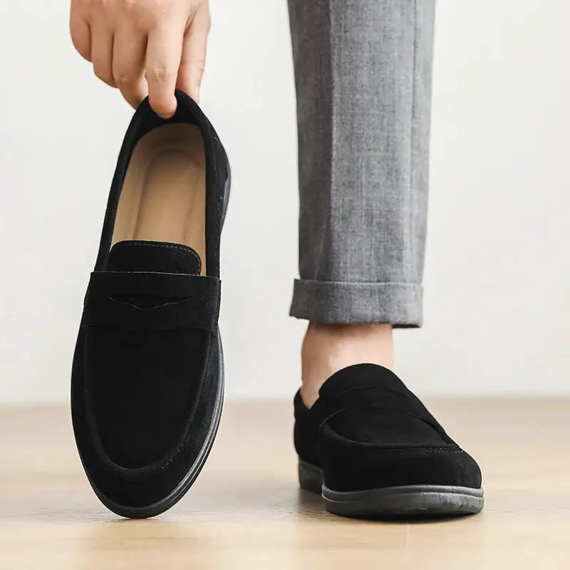 Men's black slip-on loafers with grey soles for casual daily wear