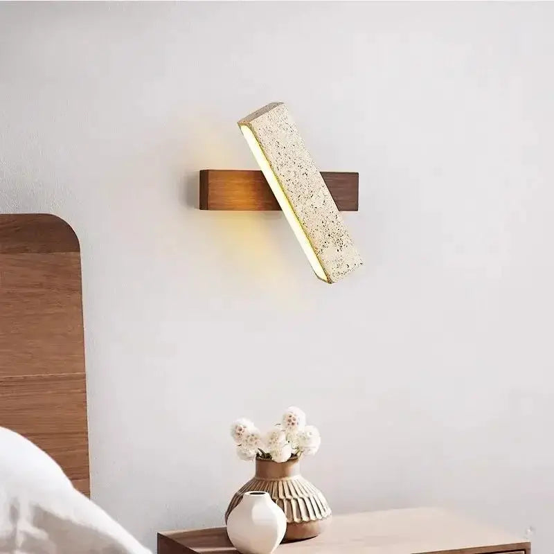 Natural Stone Wall Lamp Sconce by Simples Market with wooden backplate and warm LED light