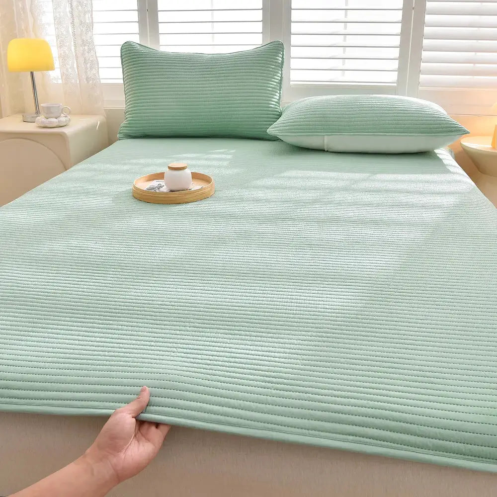 Striped waterproof mattress protector by Simples Market, mint green, soft and breathable for single/double beds