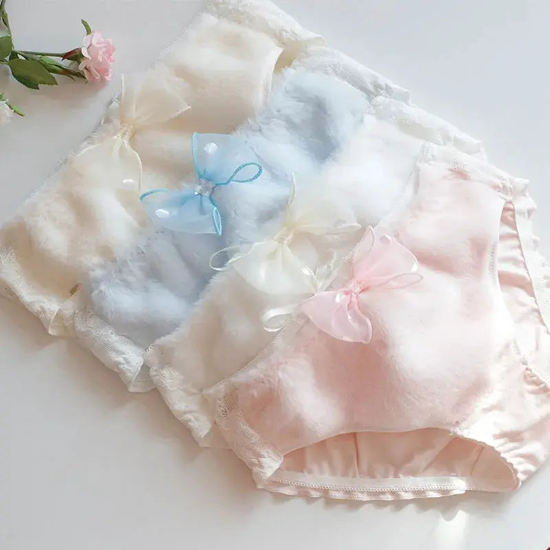 Women's cotton panties set with bow accents in pastel cream, blue and pink; lace trim, 3-pack.