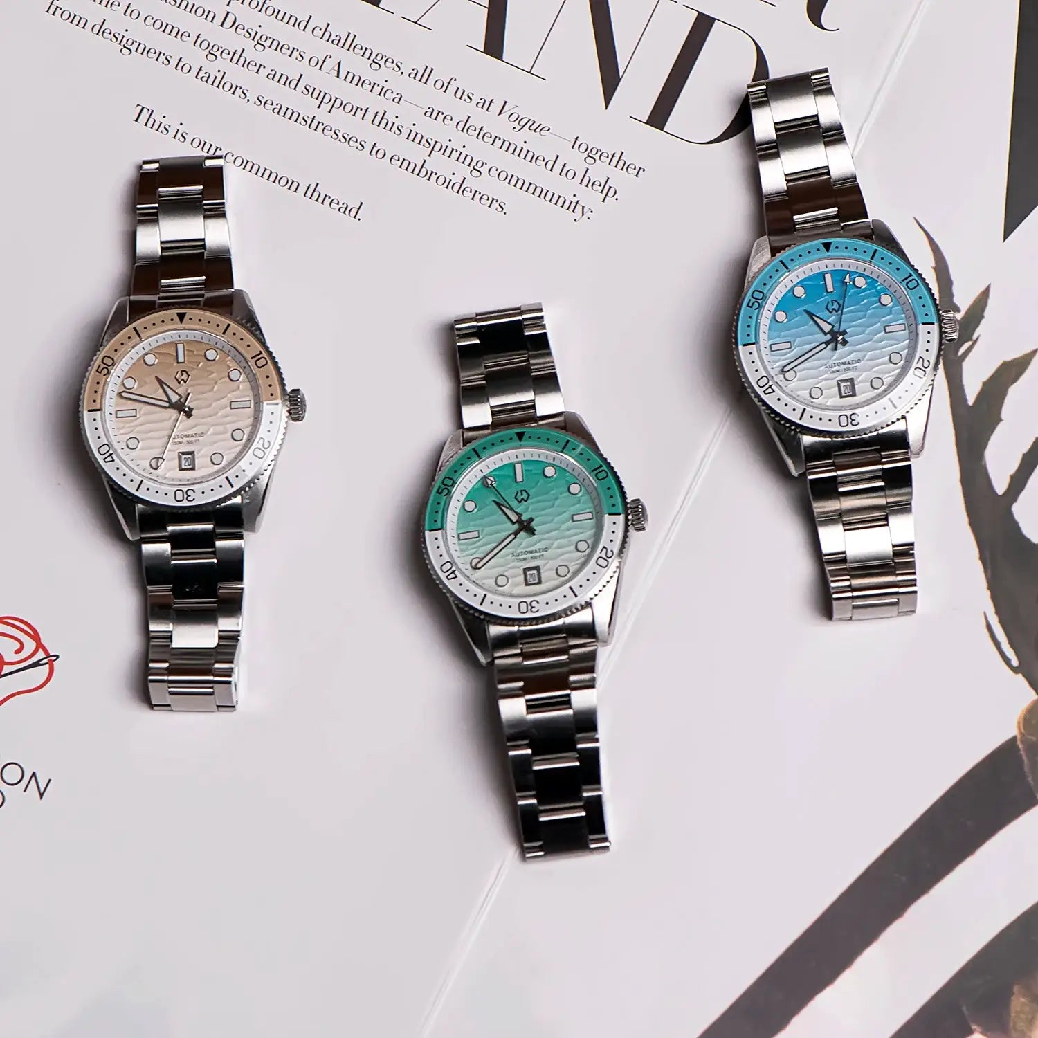 WISHDOIT men's automatic dive watches with stainless steel bracelets; ripple dials beige, teal, blue, three watches.