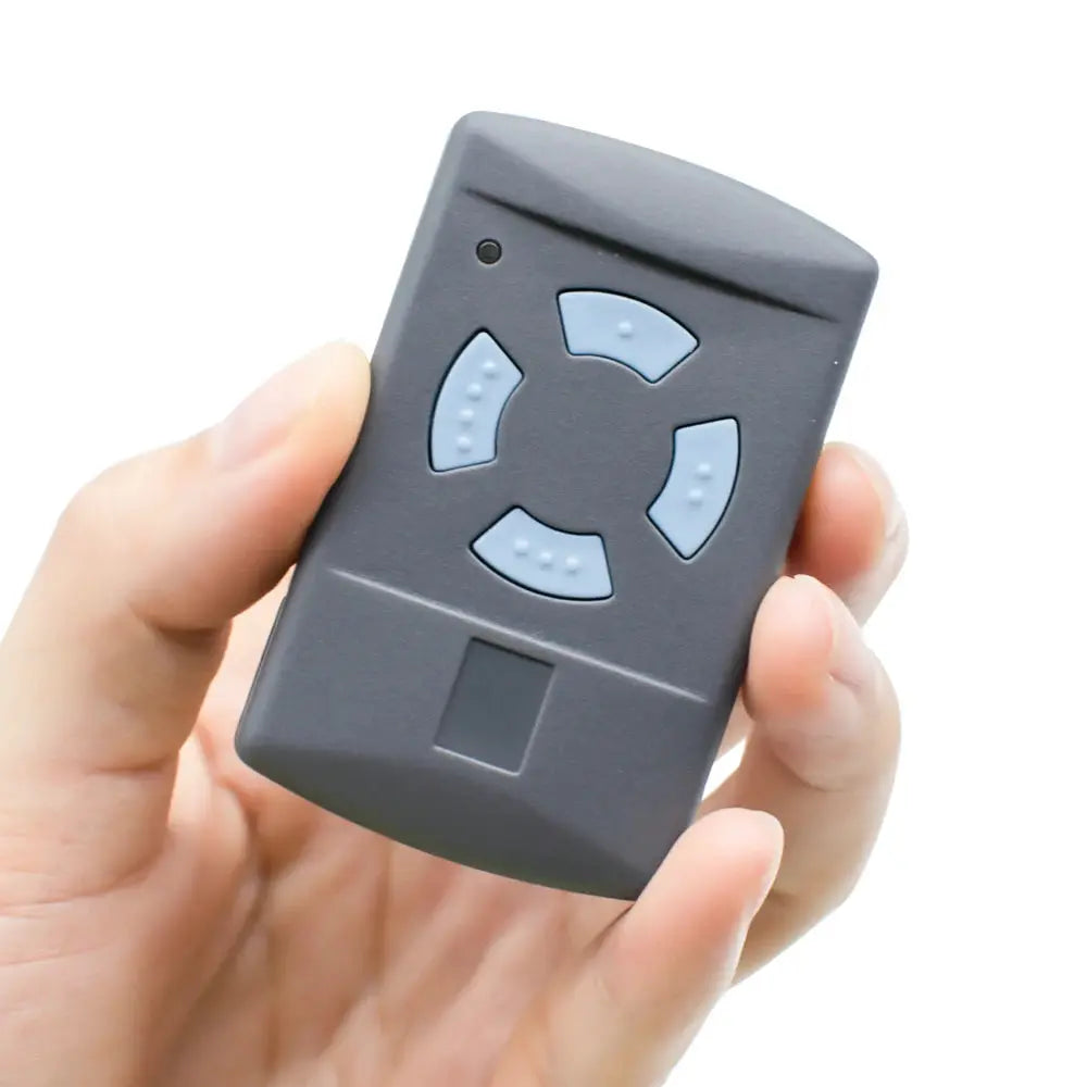 Garage door remote key fob by Simples Market, gray with blue circular buttons