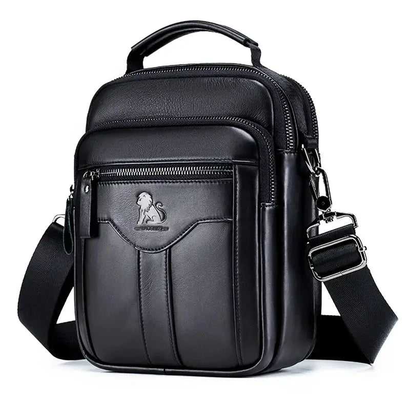 Men's black leather crossbody bag from Simples Market with front zip pocket and adjustable strap.