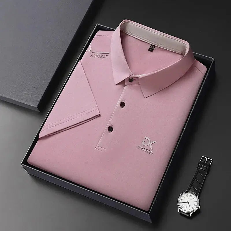 Men's pink polo shirt with a badge logo, folded in a gift box; 1 shirt and 1 wristwatch