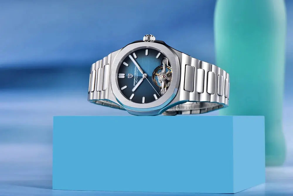 Pagani Design men's skeleton stainless steel watch with blue dial and open-heart movement, silver bracelet.