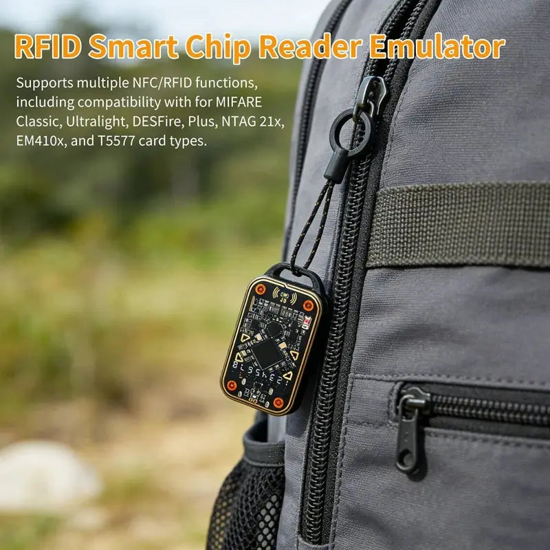 FULL-Chameleon Ultra V3.0 RFID reader, black with orange frame, by Simples Market, clipped to a backpack zipper.