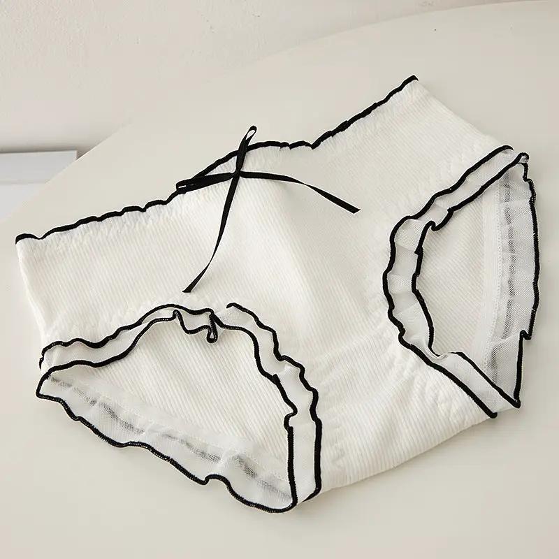 White M-XL women's underwear panty with black trim and bow detail