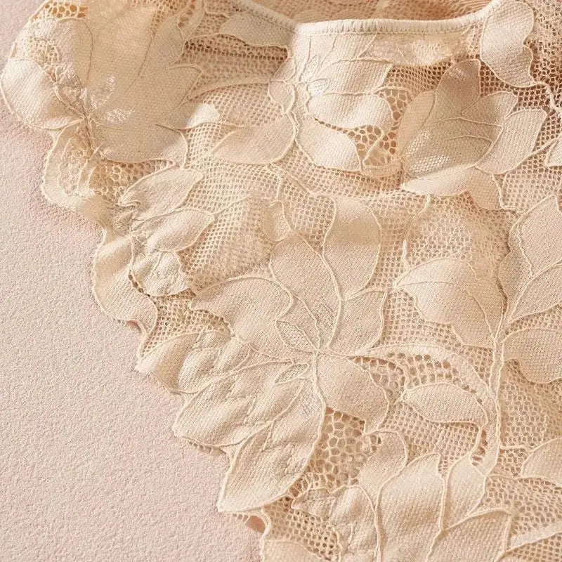 Floral lace panties fabric close-up in cream color