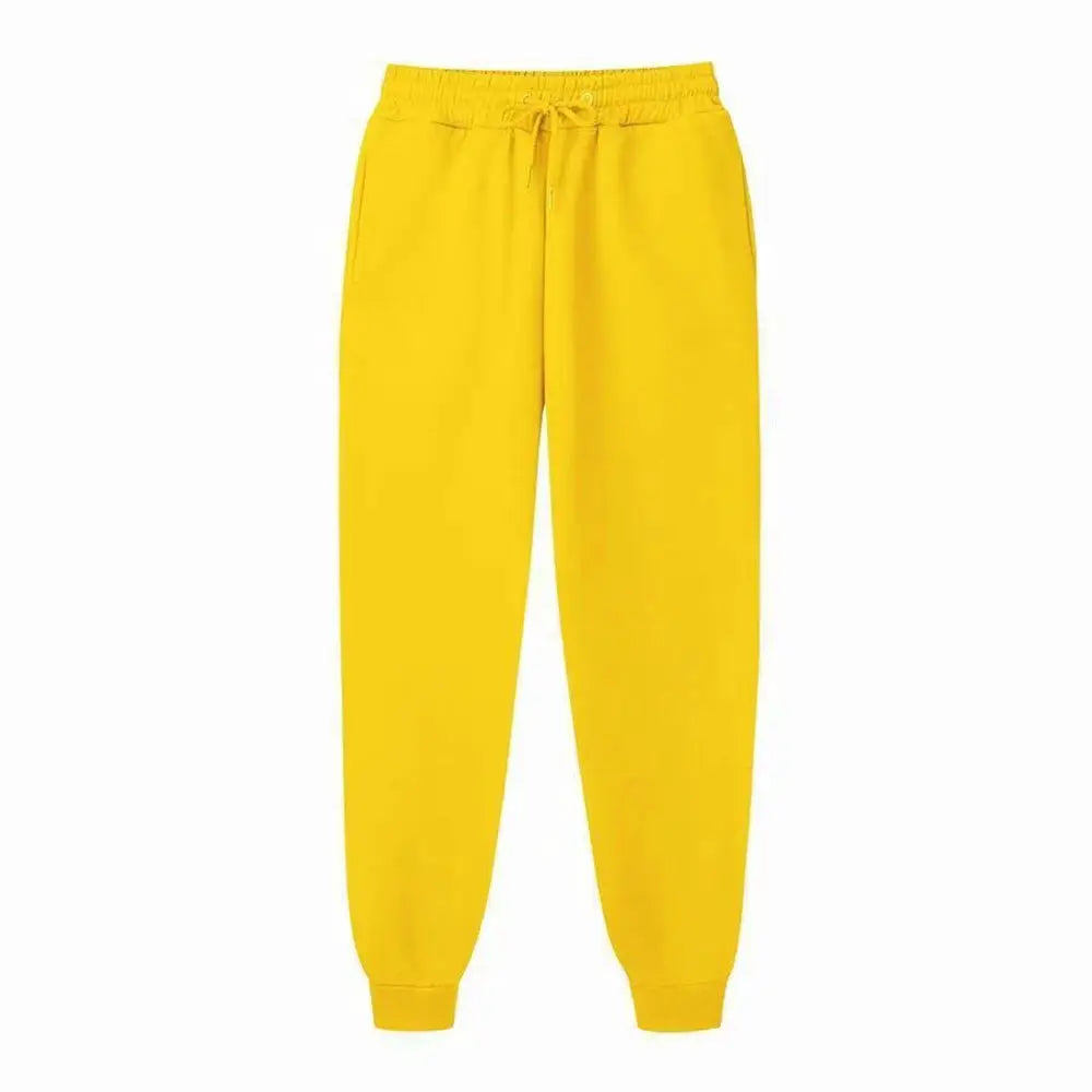 Men's yellow fleece jogger sweatpants with drawstring waist and cuffed ankles